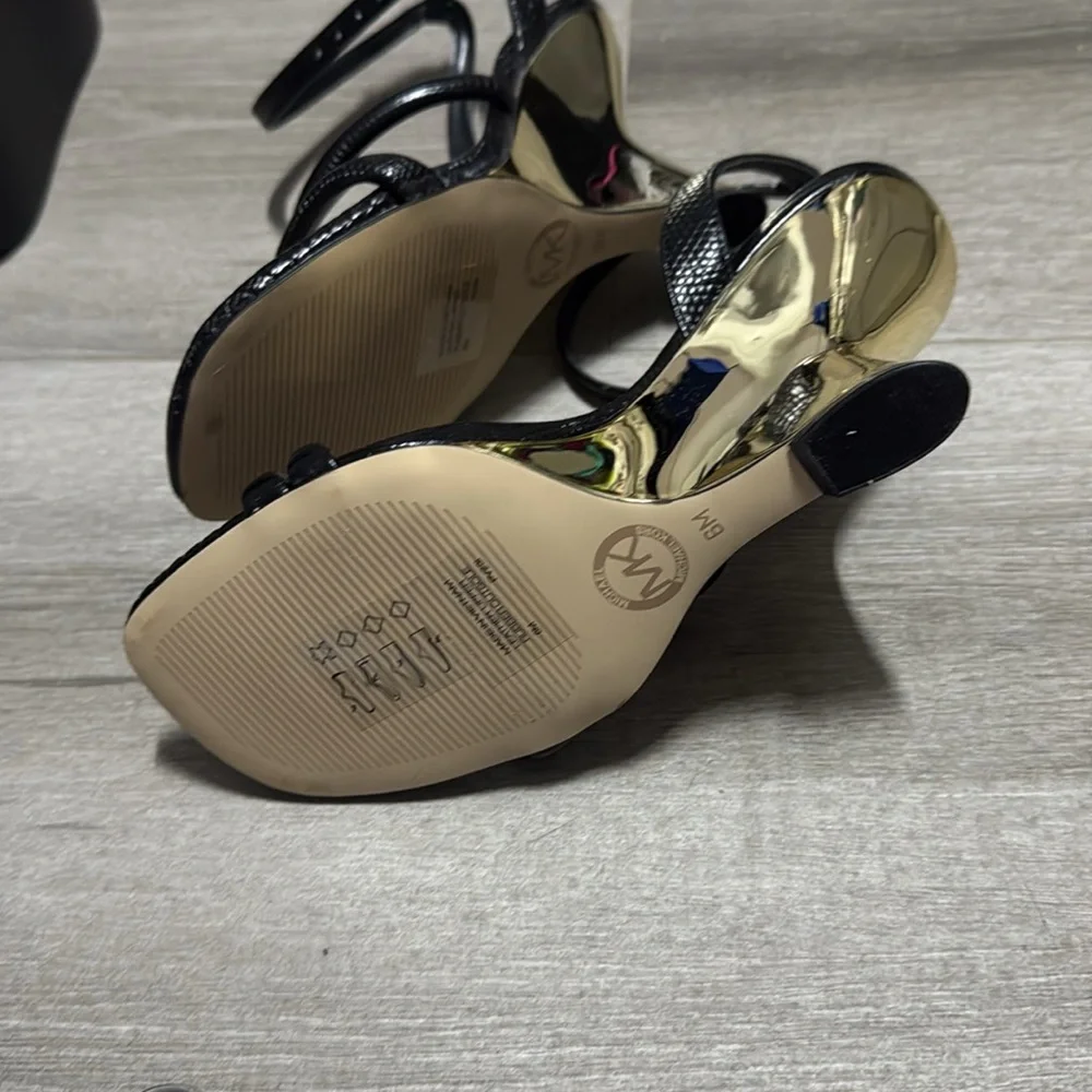 NWOT MICHAEL KORS BLACK AND GOLD WEDGE SANDALS